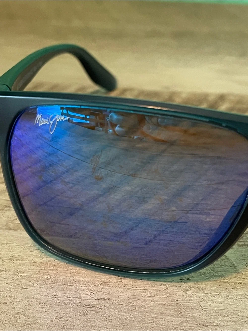 Maui Jim Black Frame Sunglasses with Blue Purple Mirrored Lenses